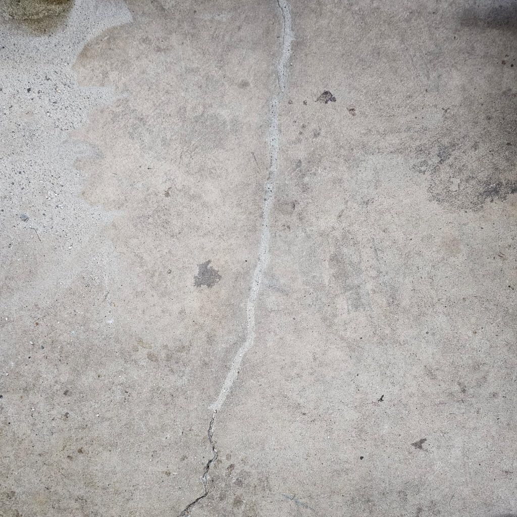 crack in the concrete after crack sealing