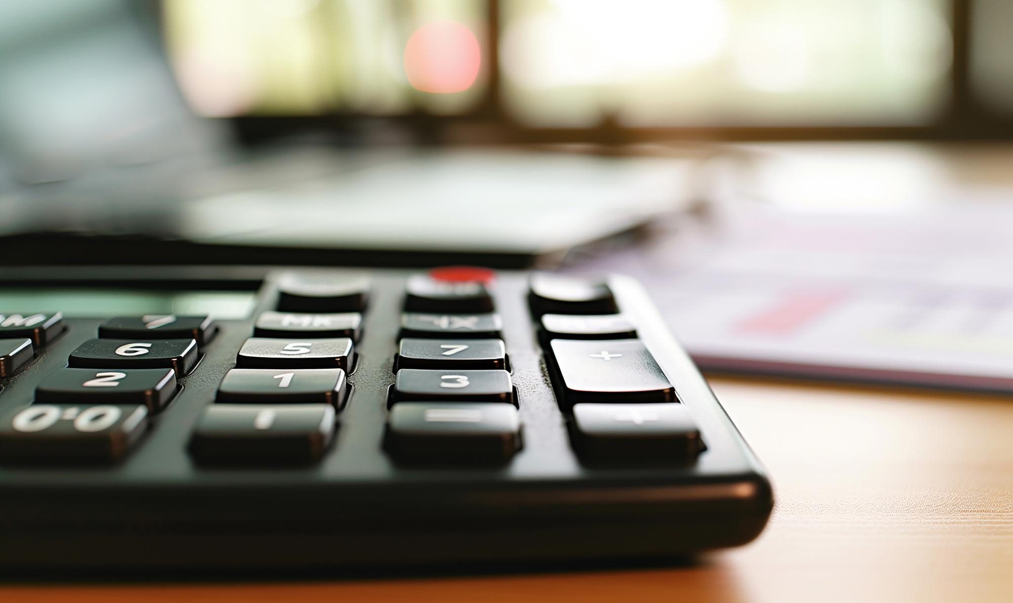 close up view of a calculator on desk