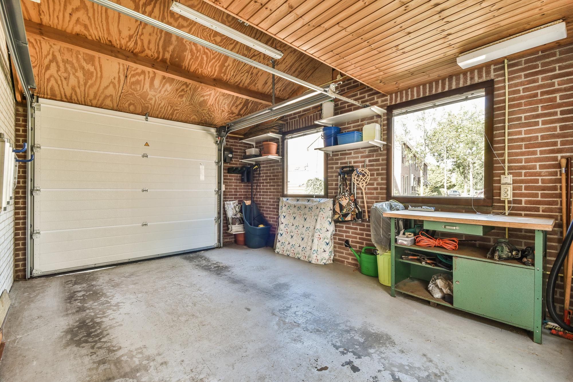 interior of a residential garage with concrete floor