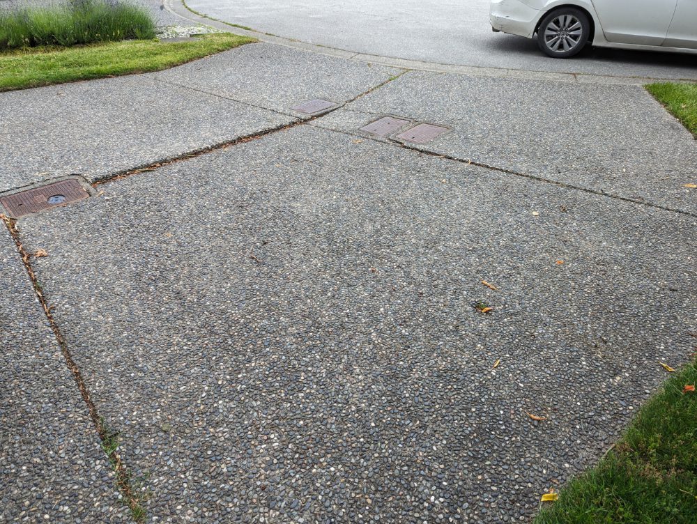 driveway which has settled unevenly