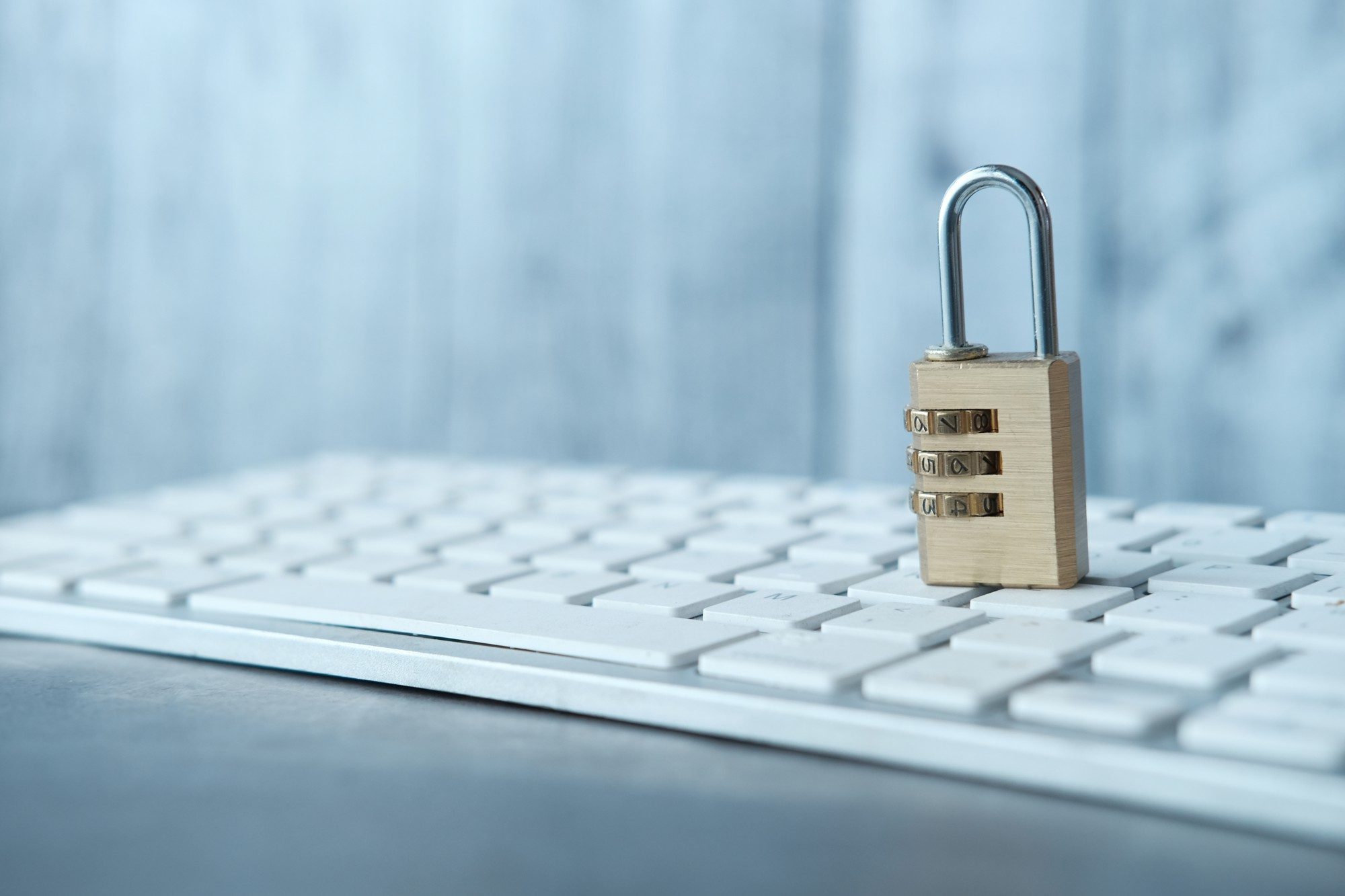 privacy policy concept with padlock on computer keyboard