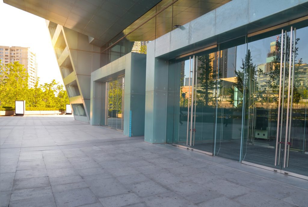 concrete outside of a retail entrance
