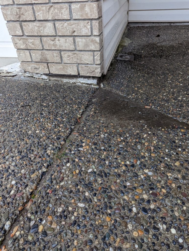 walkway and driveway before concrete lifting